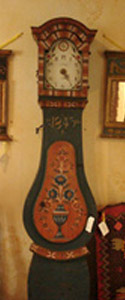 Swedish tall cass Mora clock in its original color. Dated 1843.